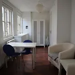 Rooms In Quiet Yellow Courtyard Apartment